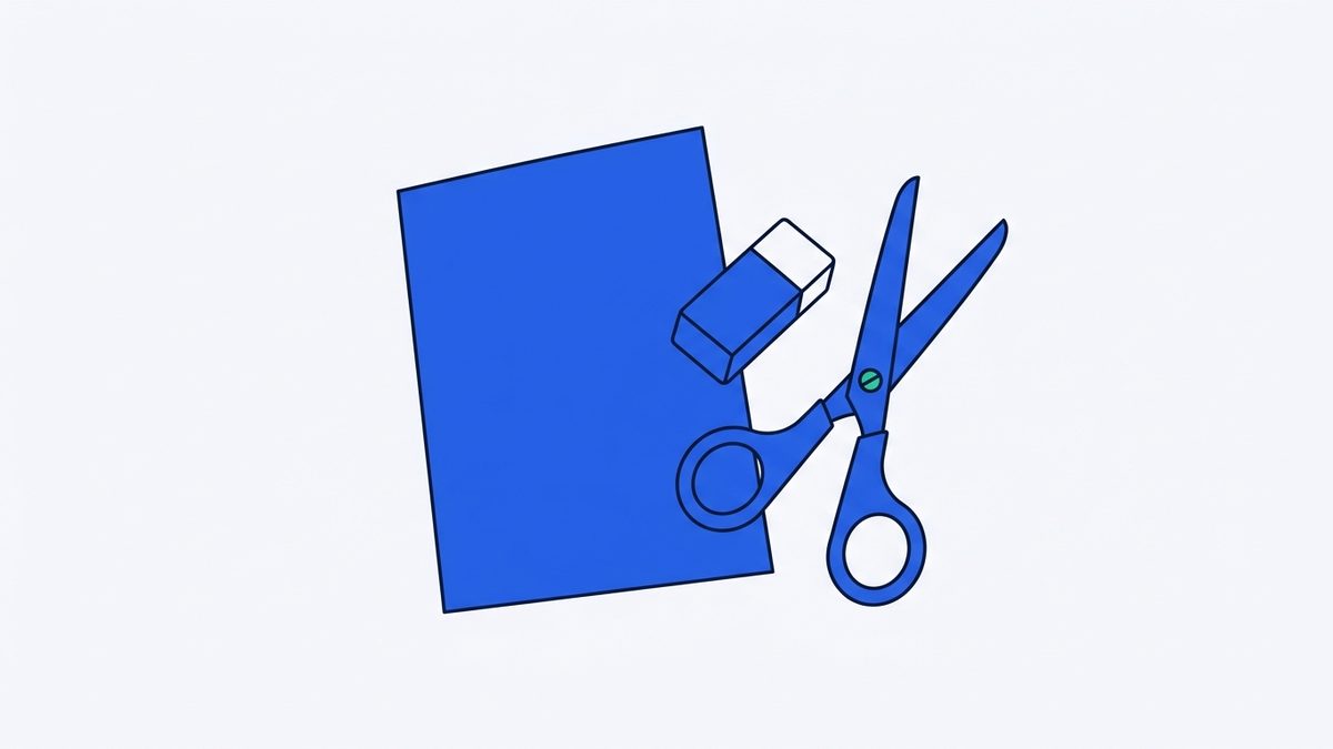 a sheet of paper, an eraser, and a pair of scissors